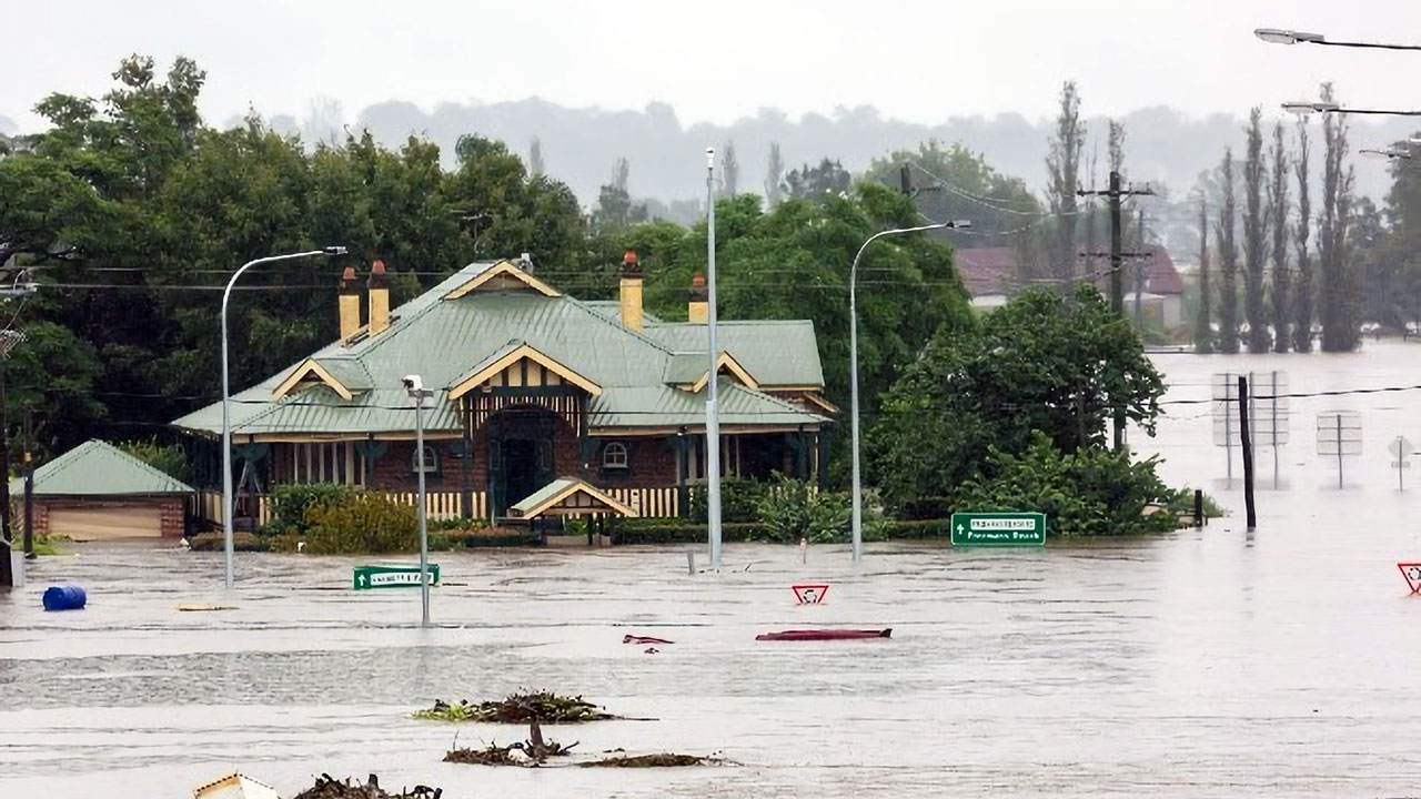 A flooded road intersection in a regional town.