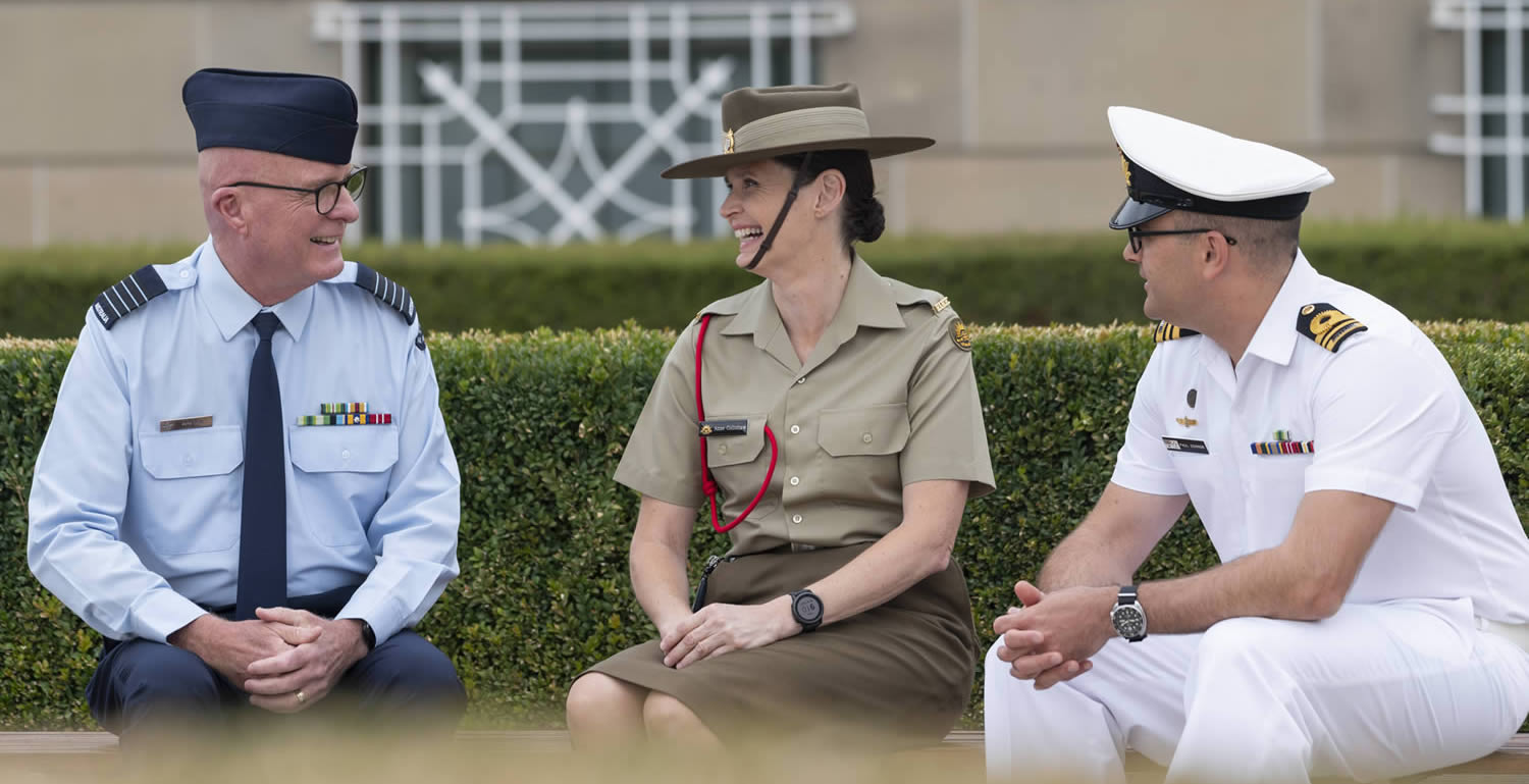Three Australia Defence Force officers in uniform from the Air Force, Army and Navy.
