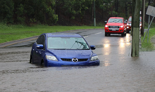 Car stuck in flood waters