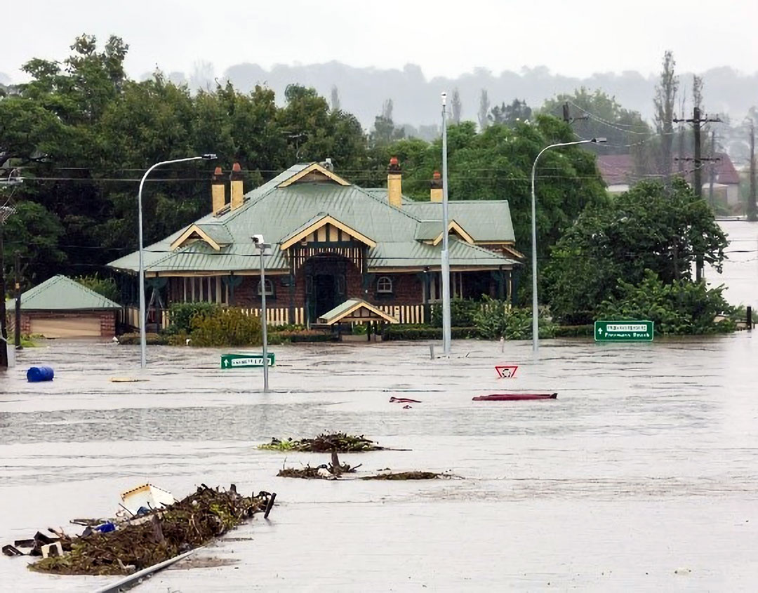 A flooded road intersection in a regional town.